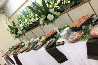 某会
